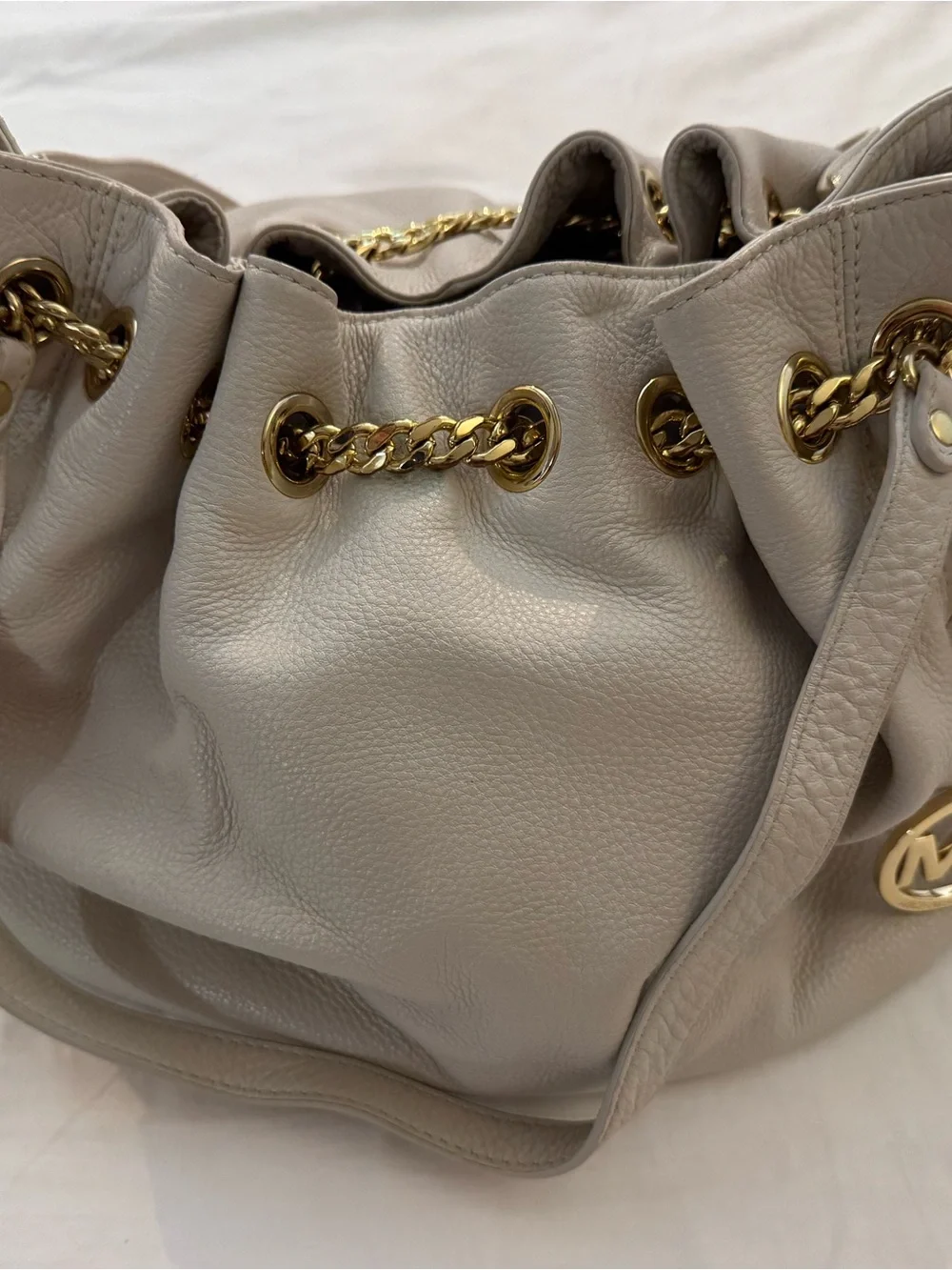 Michael Kors Off-White Pebbled Leather Drawstring Shoulder Bag | Gold Hardware